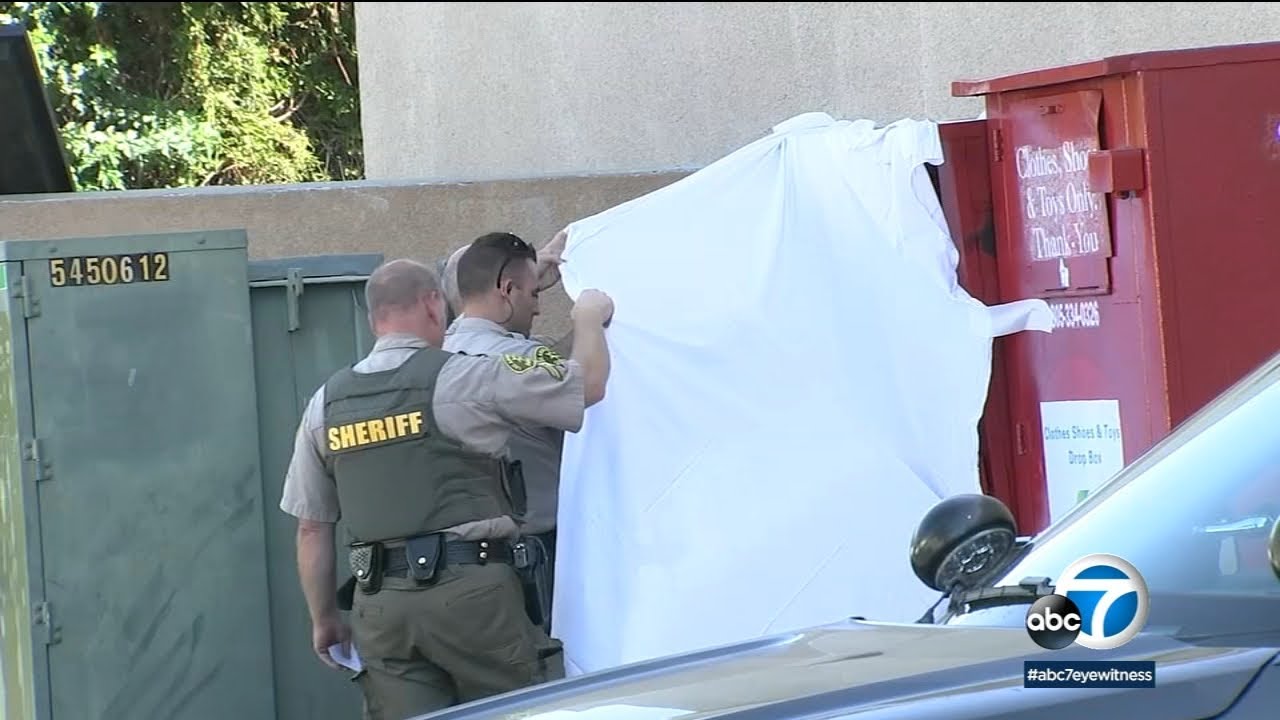 Woman’s body found in clothing collection box likely an accidental death, investigators say