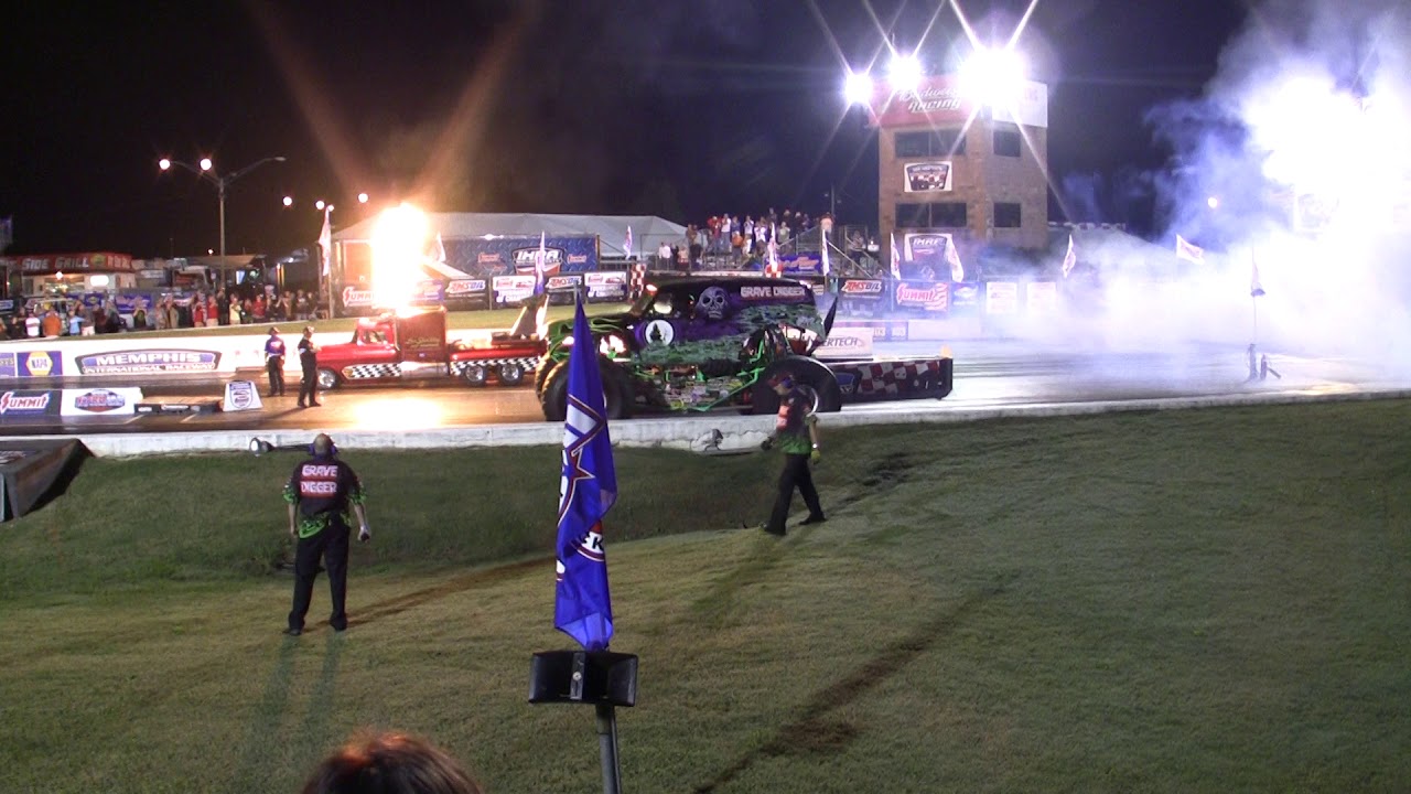 Grave Digger vs. Shockwave