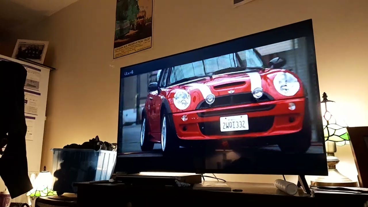 The Italian Job 2003 Film Stella Bridger test drives a Red Mini Cooper S around the Warehouse