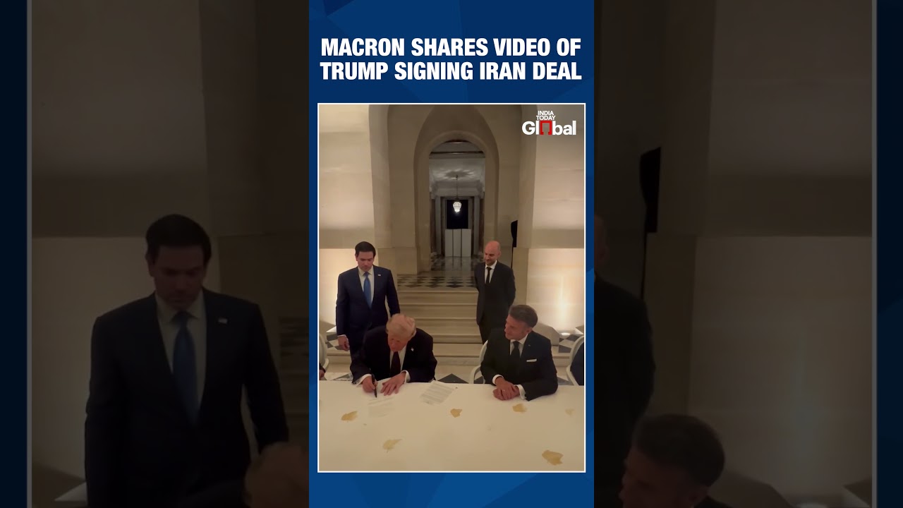 Macron Shares Video Of Trump Signing Iran Deal, Says Strait Of Hormuz Will Reopen