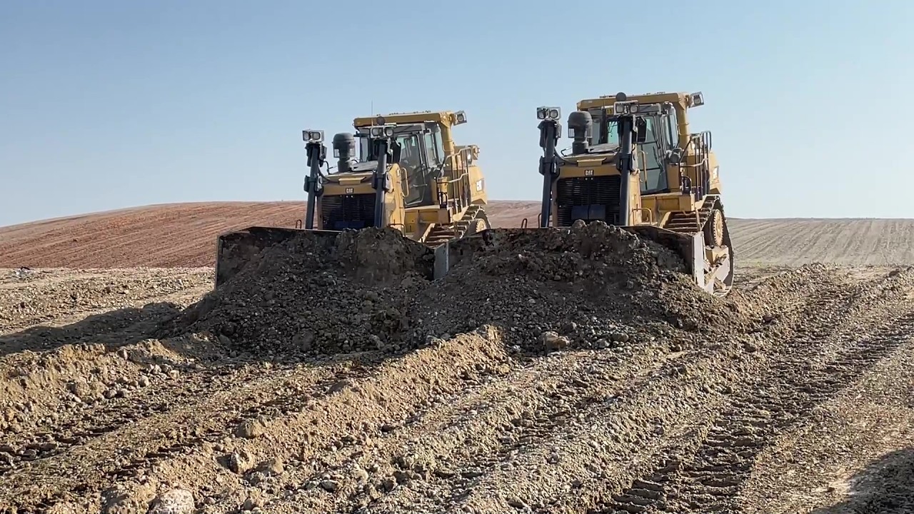 6 Caterpillar D9Ts Bulldozers In Action - Drone View