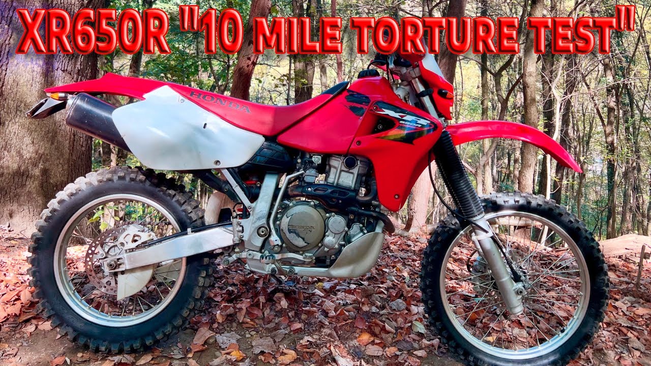 wrestling the XR650R on gnarly, tight and technical singletrack.  It can do tight woods too!