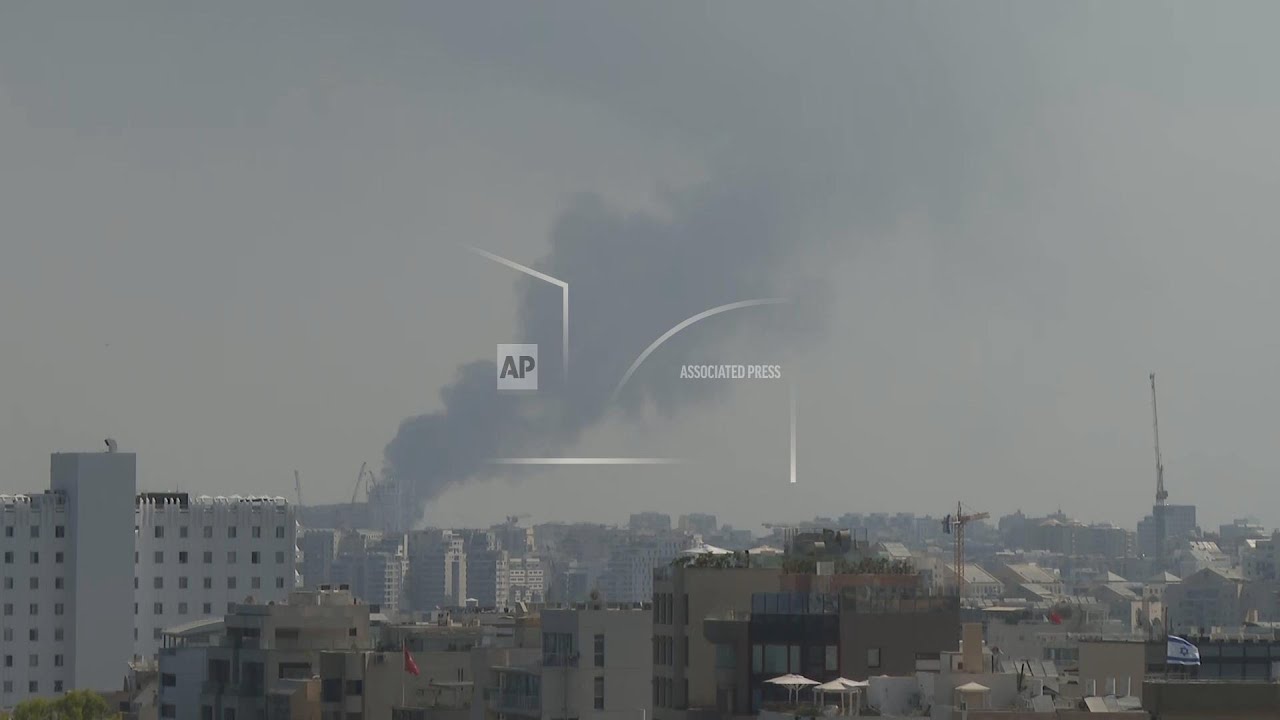 Smoke billows over Tel Aviv skyline amid reports of more Iranian strikes