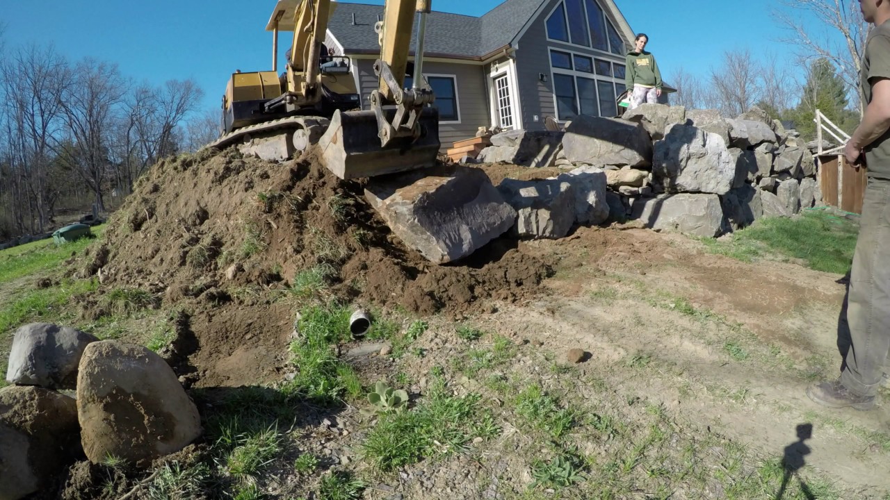 Building a Sand volleyball court and bluestone patio