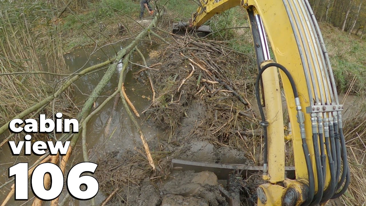 Beaver Dam Removal With Excavator No.106 - Cabin View - And Pulling Out A Tree Felled By Beavers