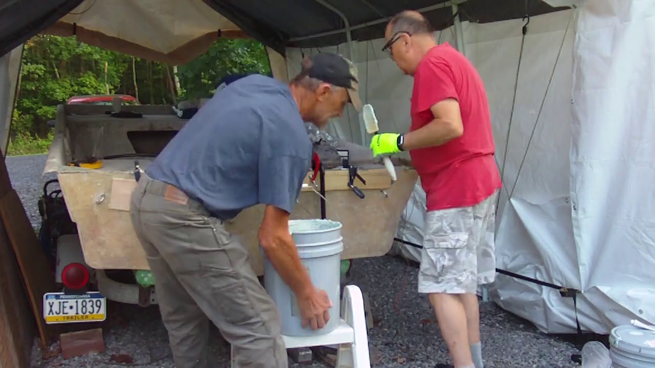 Seacast mixing and pouring into transom