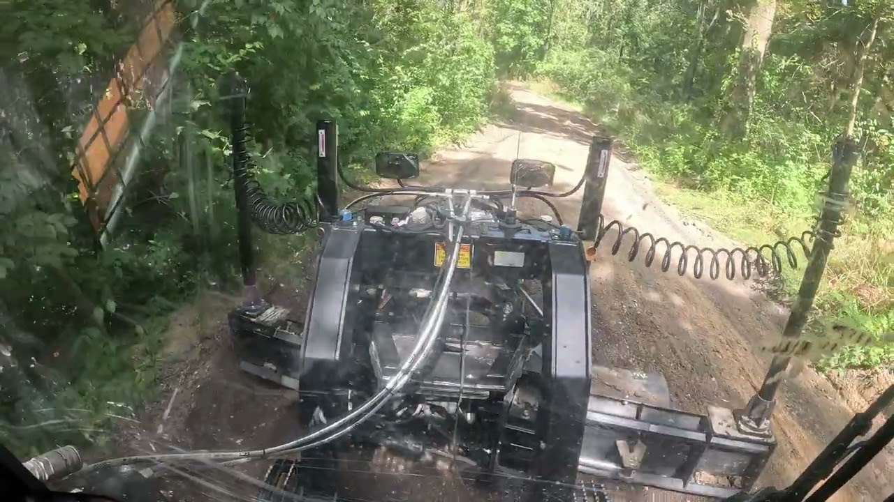 Bryan learns GPS in the skidsteer on his driveway