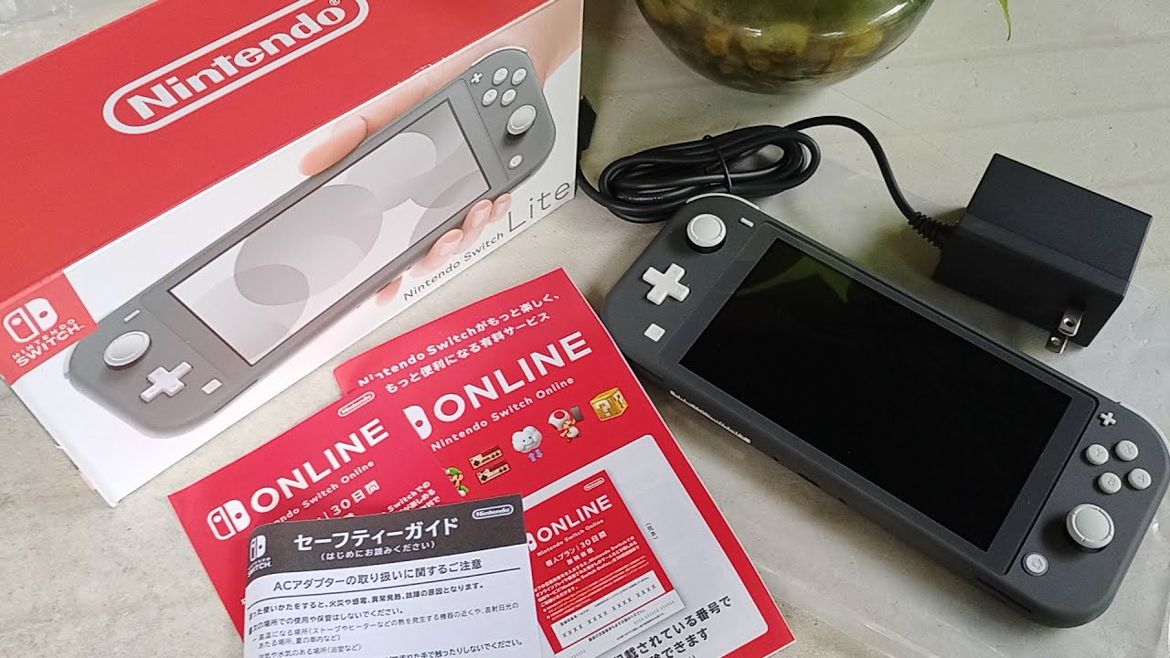 UNBOXING AND SETTING UP NINTENDO SWITCH LITE