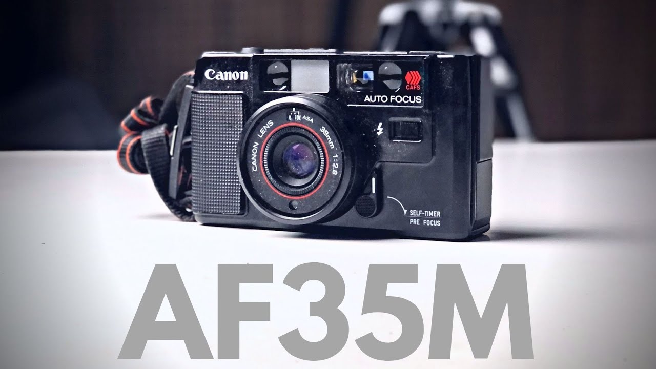 How to USE a CANON AF35M 35mm Film Camera - BATTERY Replacement & LOAD Film
