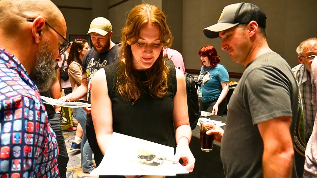 Collectors Spend THOUSANDS on Original Art at the Heroes Con Saturday Night Auction!