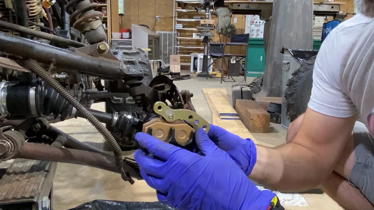 Changing front calipers on my 2000 Kawasaki Bayou 300 4x4 with bleeding.