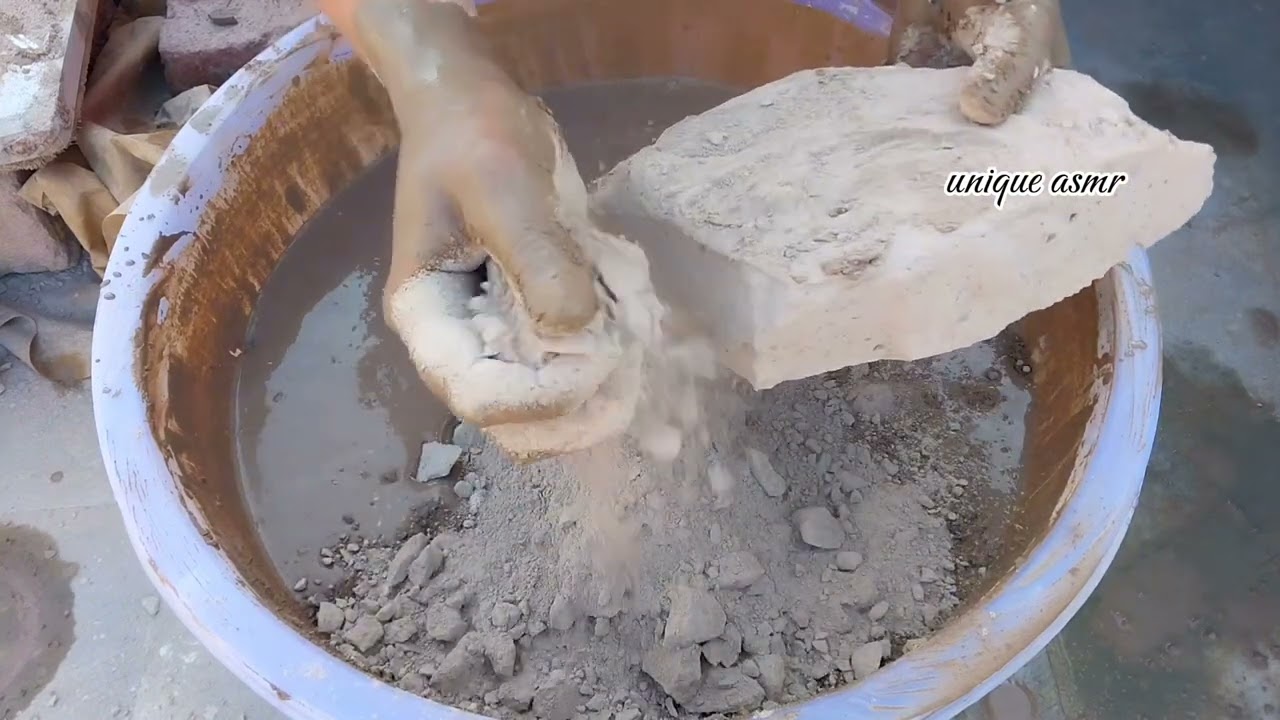 Soft dirt non-stop crumbling in water
