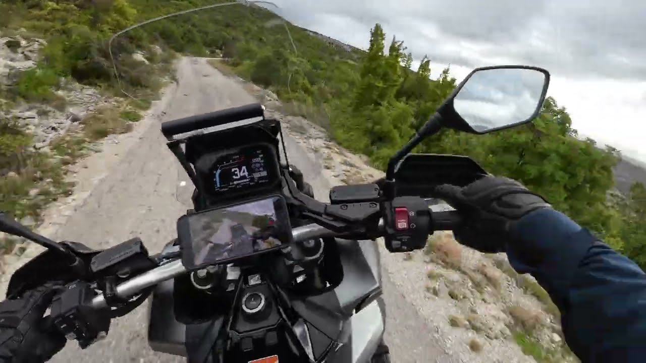 Honda XADV 750 ride on narrow tarmac road [RAW]