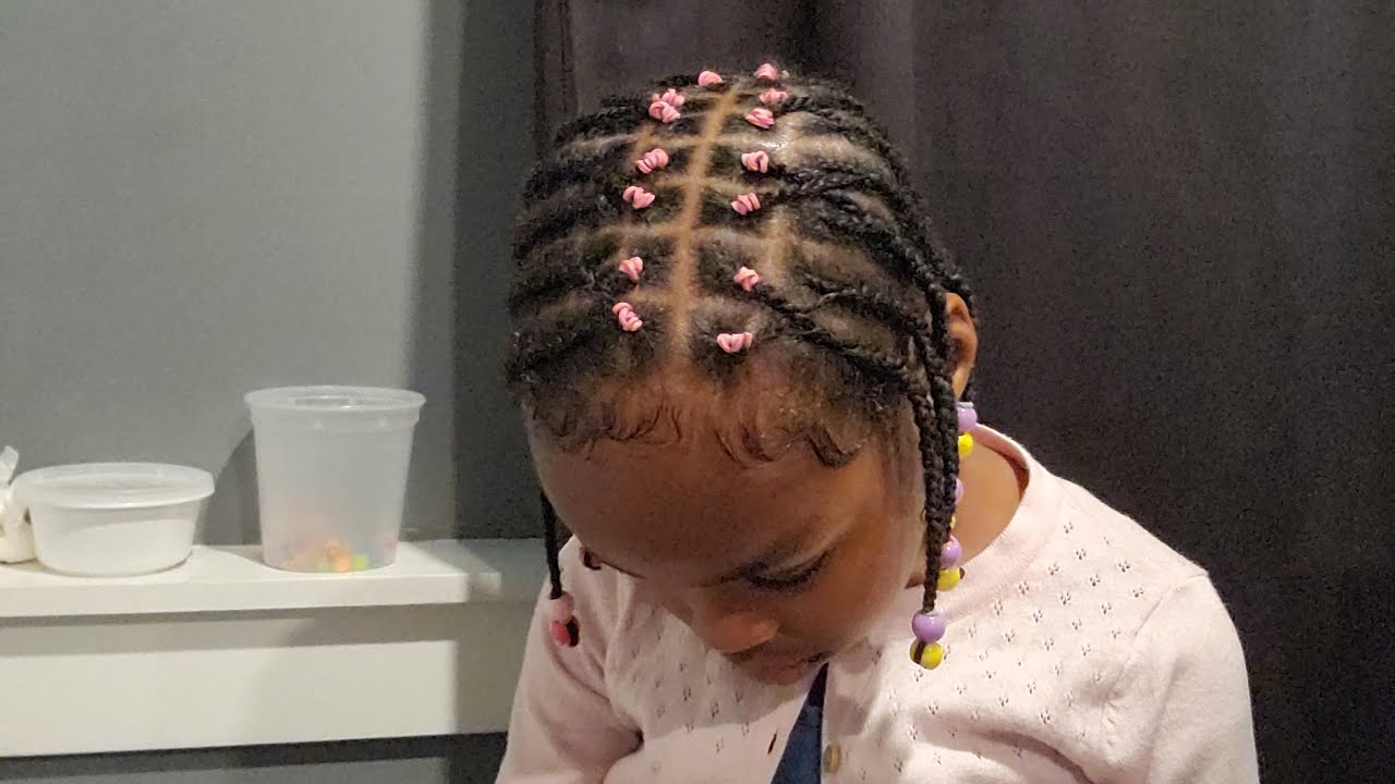 Easy kids' cornrow hairstyle for natural hair with beads