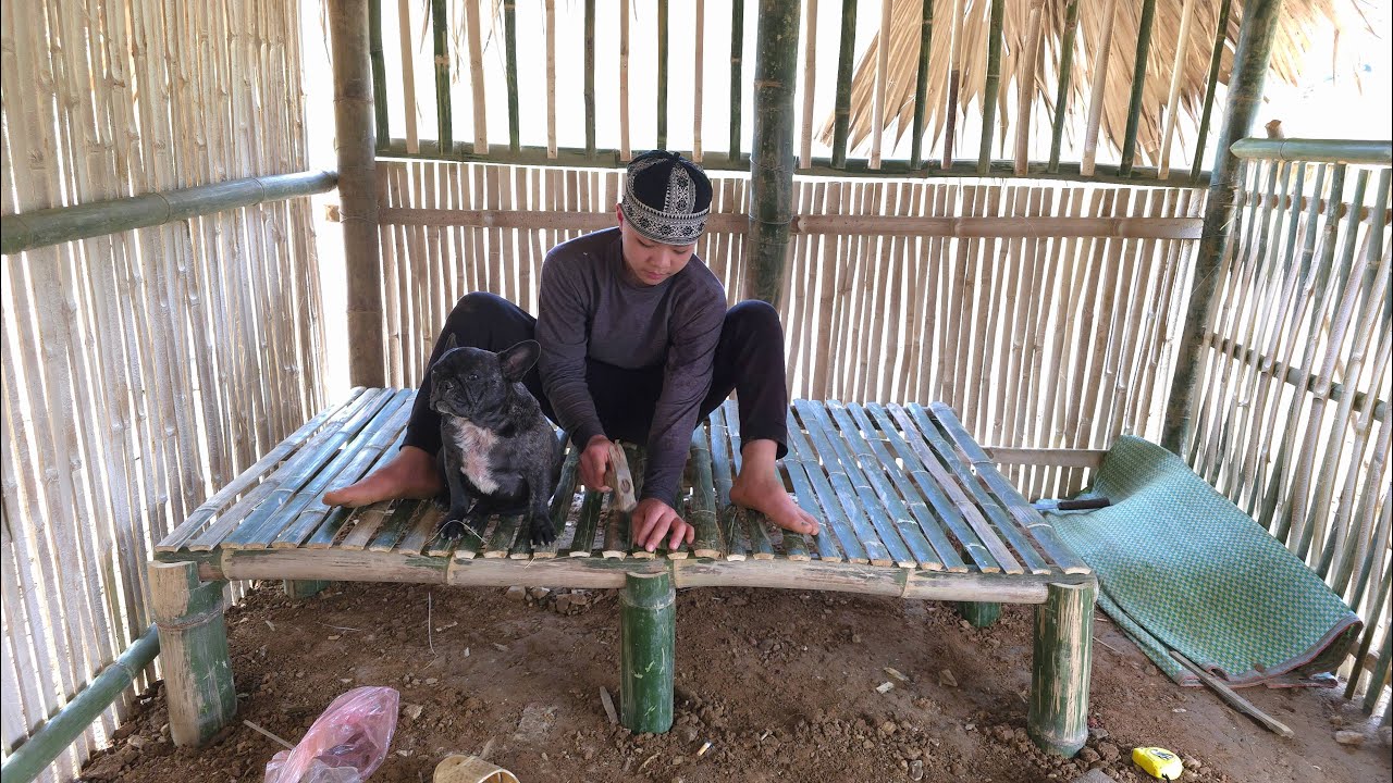 The Orphan Boy - Renovating the old house, transporting bamboo to remake the bed .