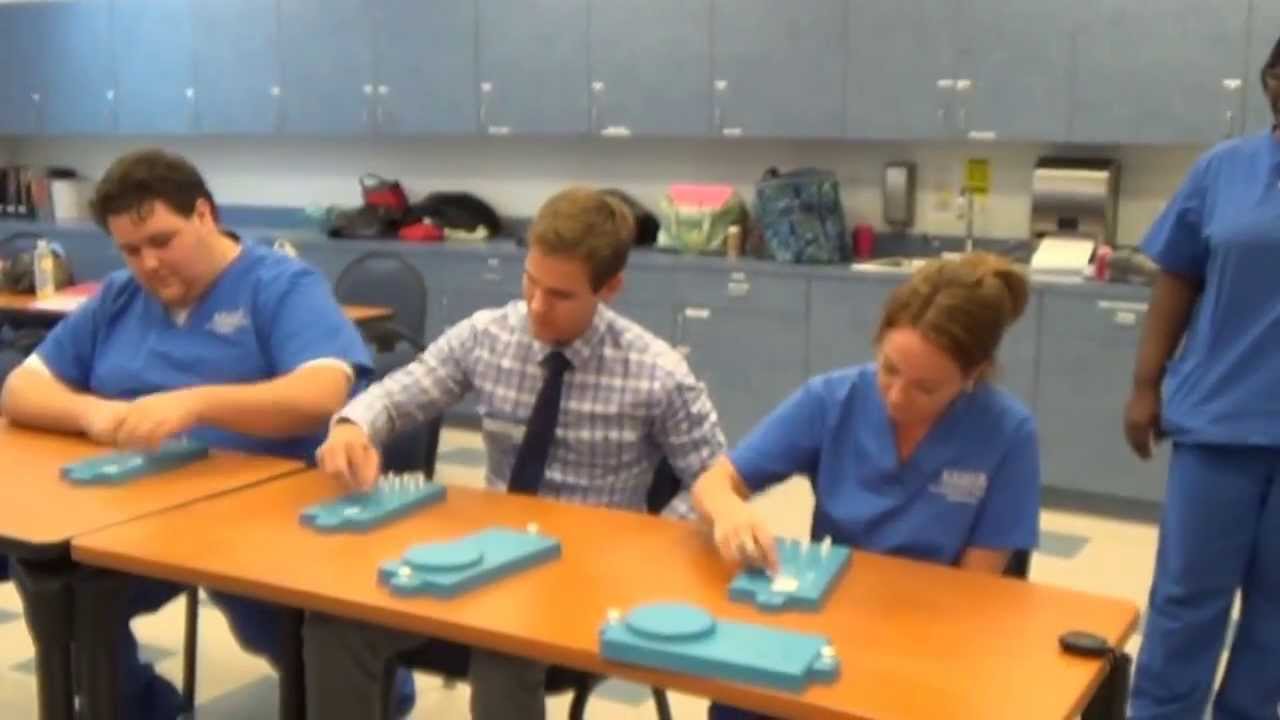 Medical Assisting Students Test Their Hands Speed and Dexterity