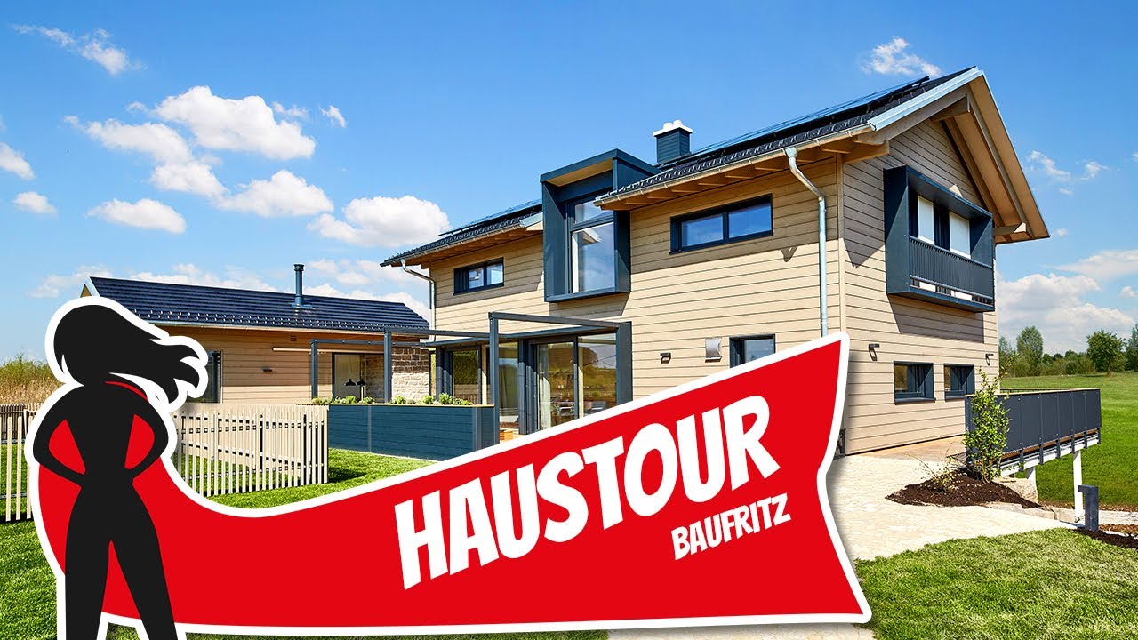 Haustour: Landhaus Heimat 4.0 - Haus am Hang mit Einliegerwohnung von Baufritz | Hausbau Helden