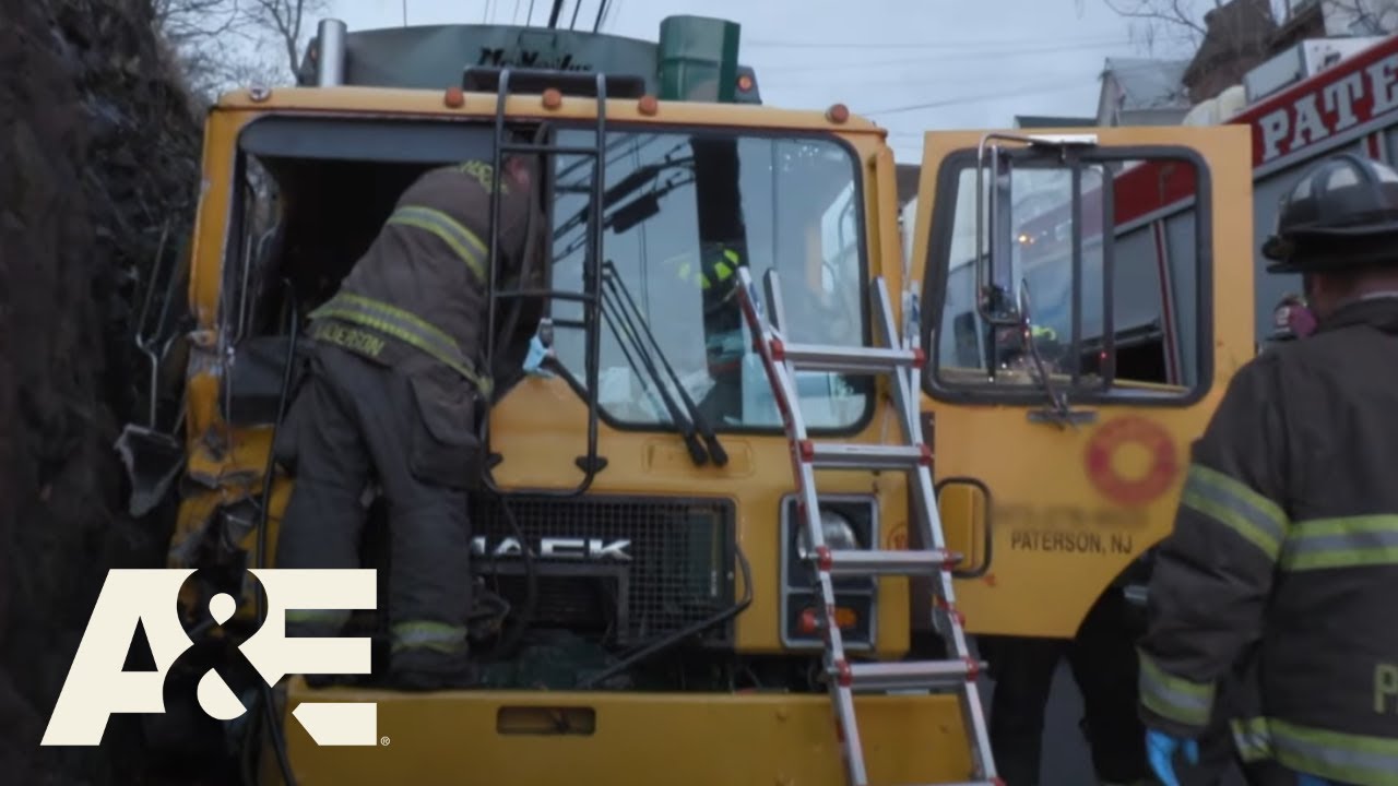 Live Rescue: Trapped in a Trash Truck (Season 3) | A&E