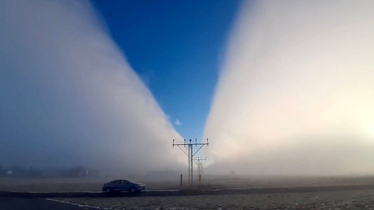 Giant Antonov Cuts Through Fog