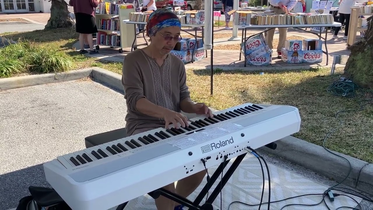 Breezin / While my guitar gently weeps