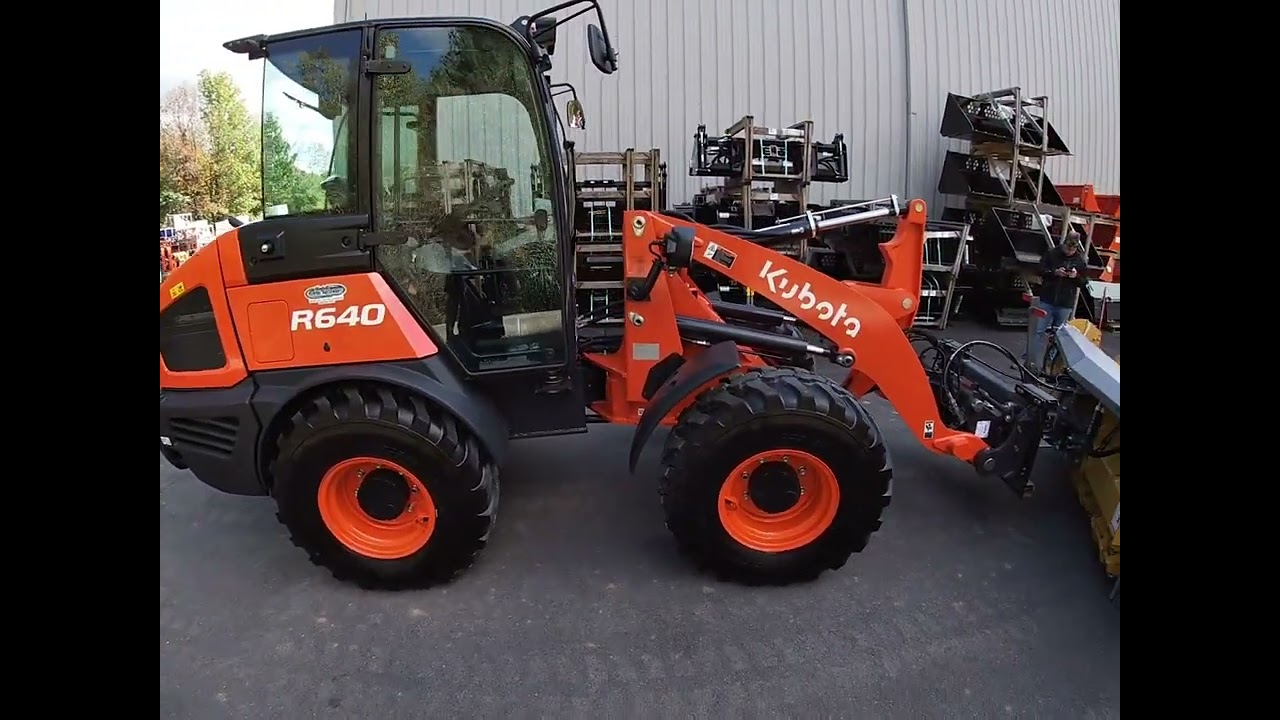 Kubota R640 testing out a metal pless snow pusher