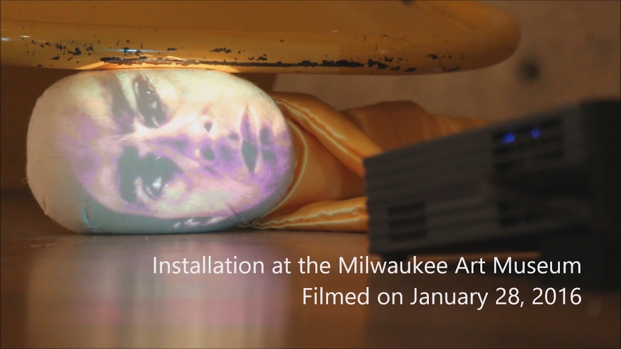 Self-Portrait in Yellow - Tony Oursler