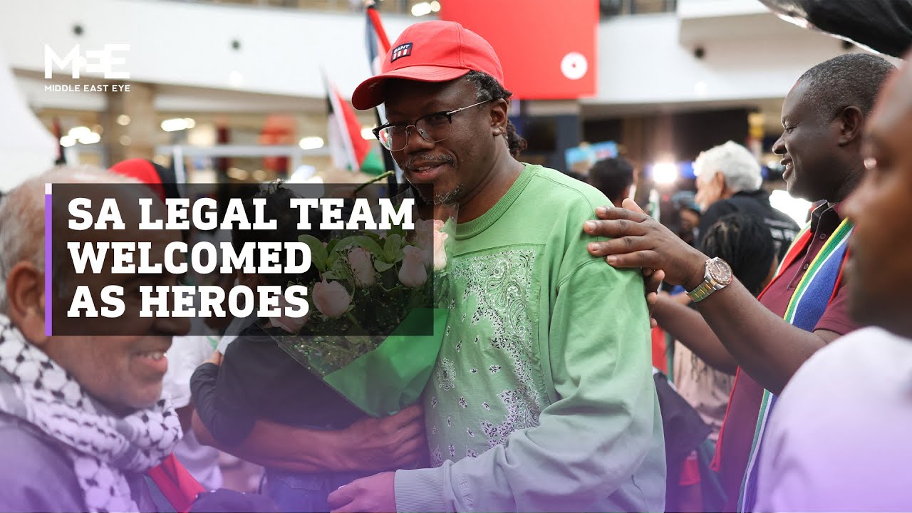 South African legal team returns home to a rapturous welcome