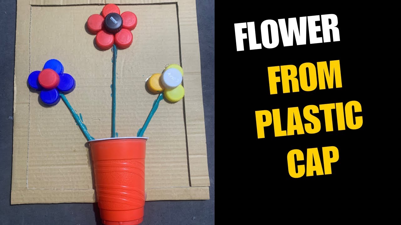 Easy way to reuse plastic cap and cardboard to make flower for home decor. #homedecor ##diy#recycle