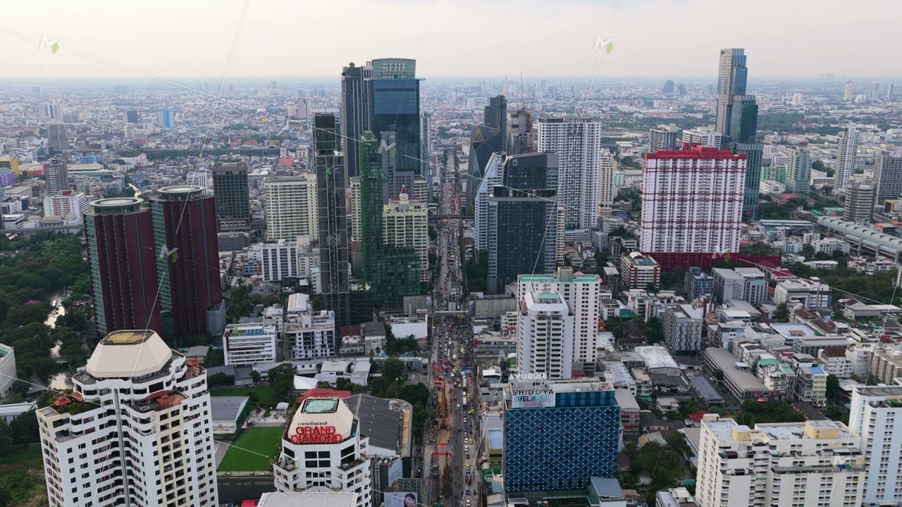 High aerial tripod view of central business district Bangkok, Thailand, showing urban landscape with