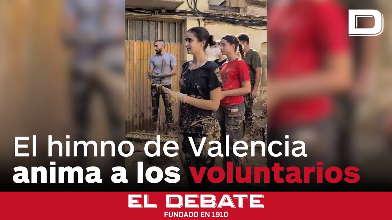 El himno de Valencia, aliento de los voluntarios en la zona cero de la DANA