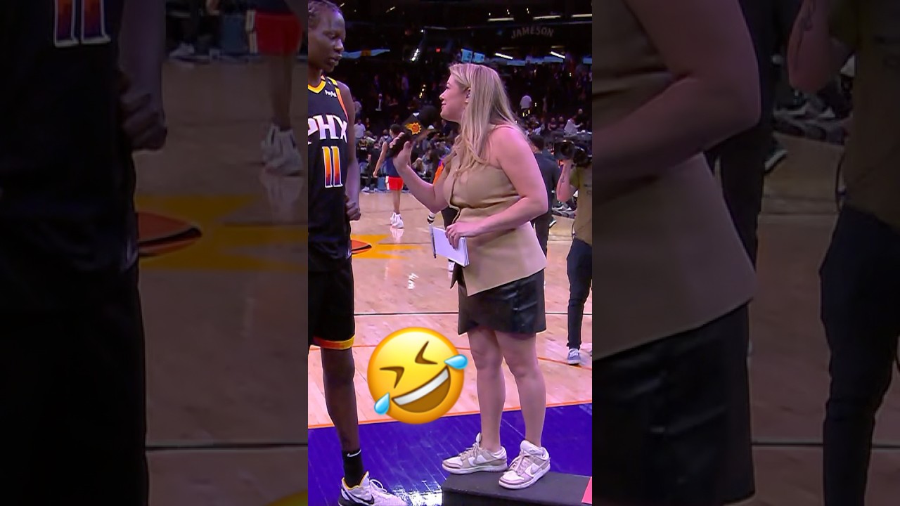 She had to get on a stool to interview Bol Bol 🤣