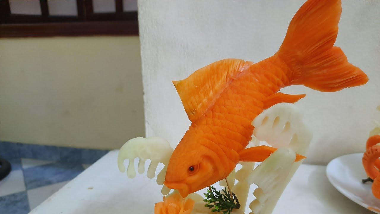 Tỉa cá từ cà rốt/Trim the fish from carrots