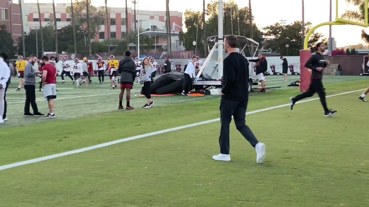 New USC football coach Lincoln Riley watches practice Tuesday