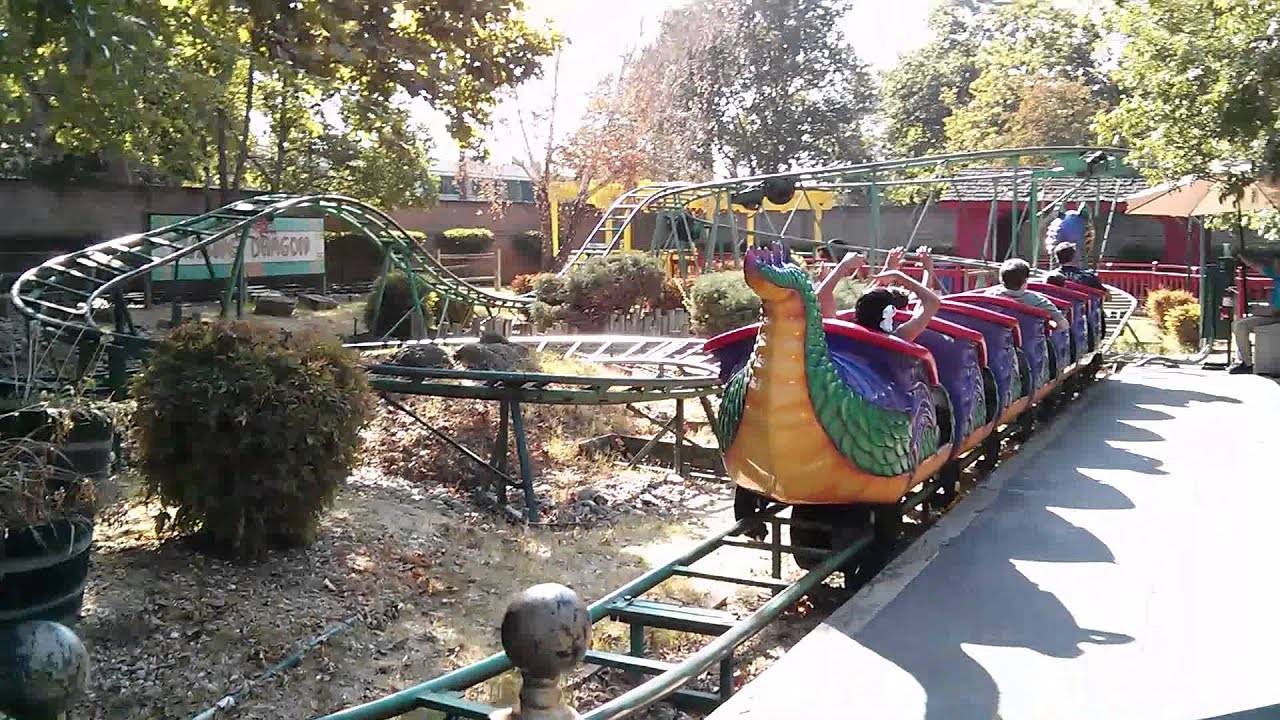 Kiana, Levi, and their dad on the Flying Dragon