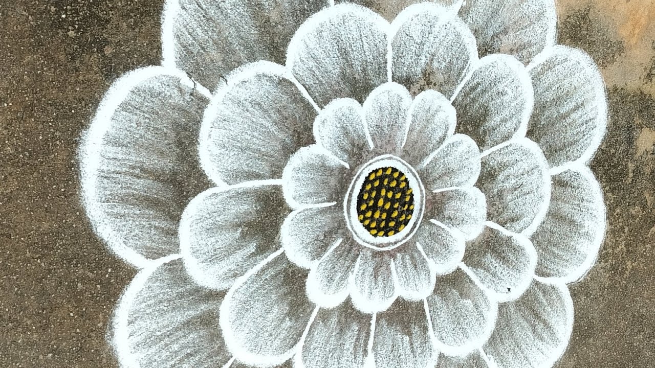 Easy unique rangoli#uniquebeautifulrangoli#freehandrangoli#withoutchukkirangoli#flowerrangoli