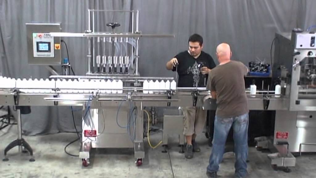 Multiple Acasi Machines working with trigger spray caps and 500 ml container   unscrambler   filler