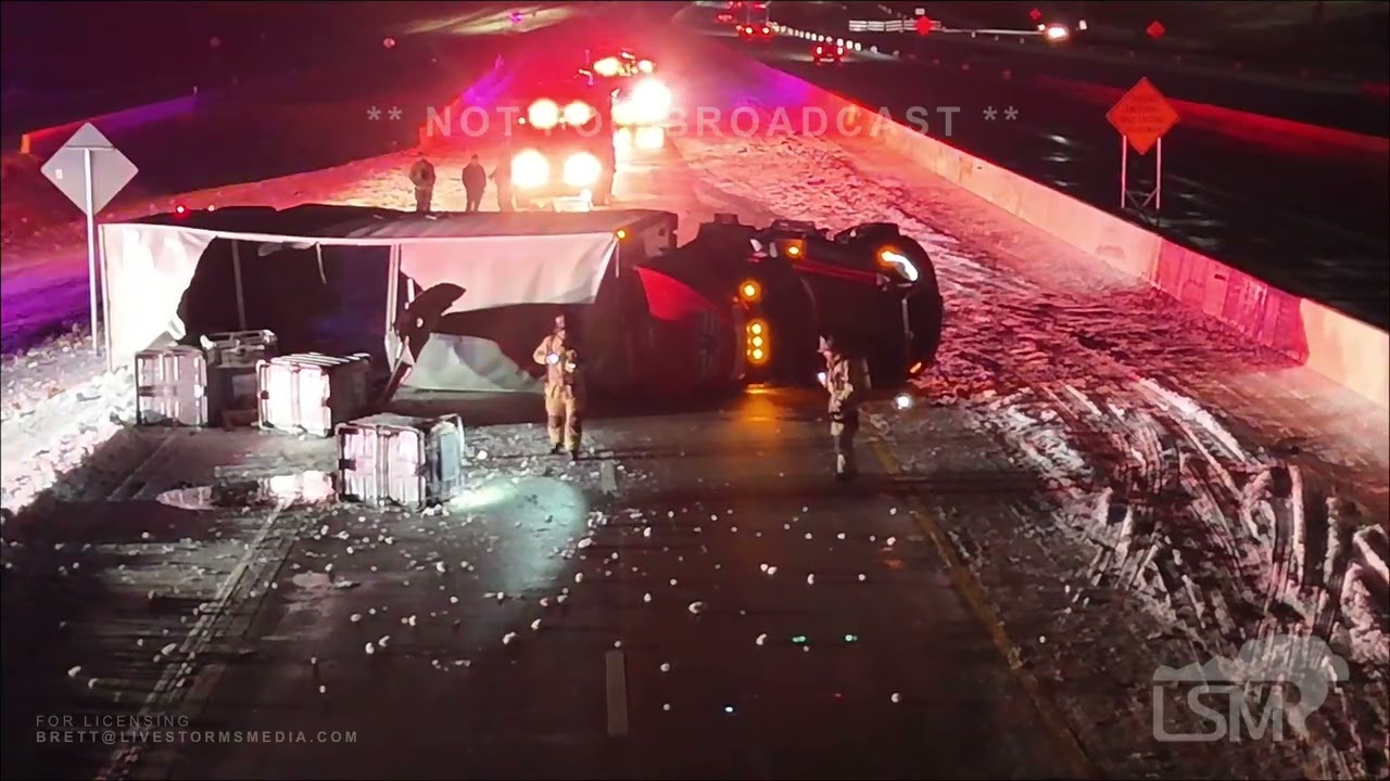 01-29-2026 Roanoke, TX  - Semi loses control on icey bridge causing hazmat spill