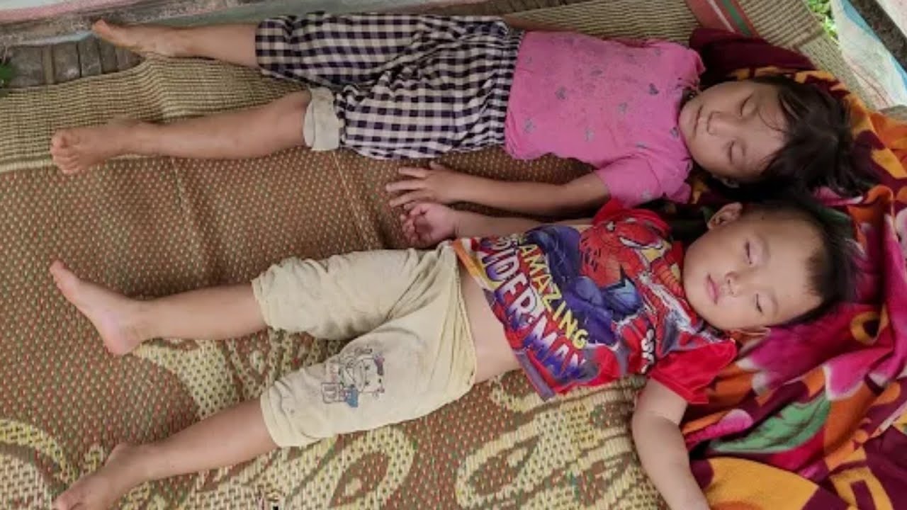 single mother takes 2 children to earn money 