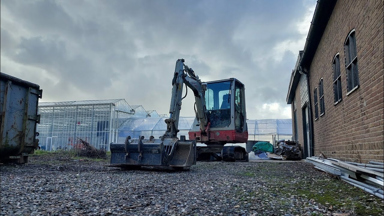 slootkant netjes maken (takeuchi tb288)