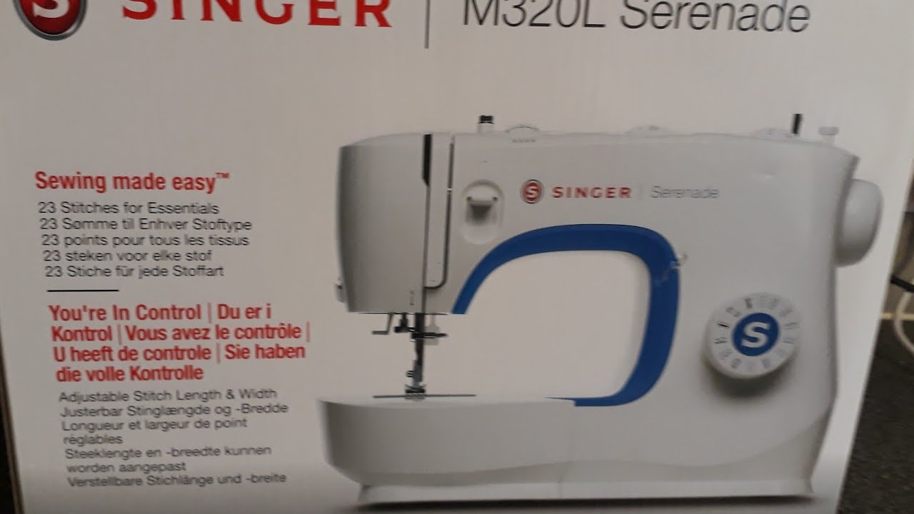 New  singer sewing machine m320L serenade..  lid...video 1