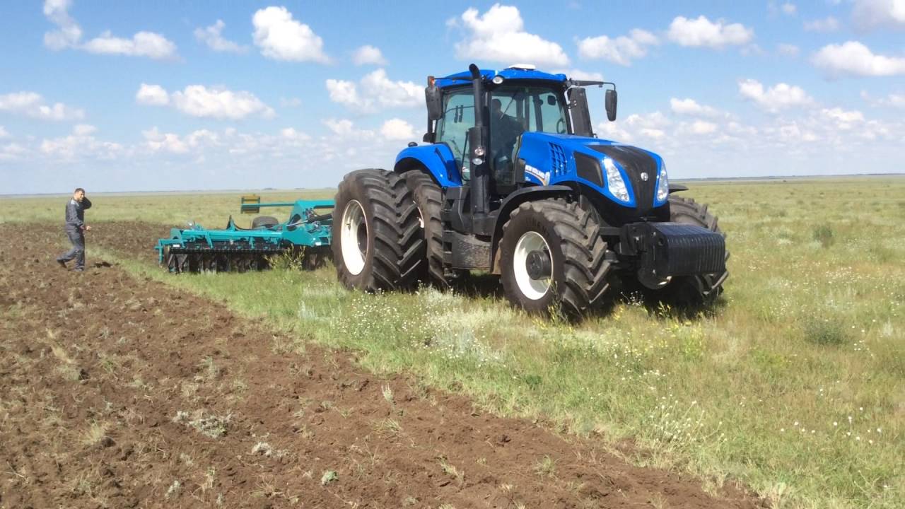 16 Трактор New Holland T8 410 с дисковой бороной ПромАгро Мастер