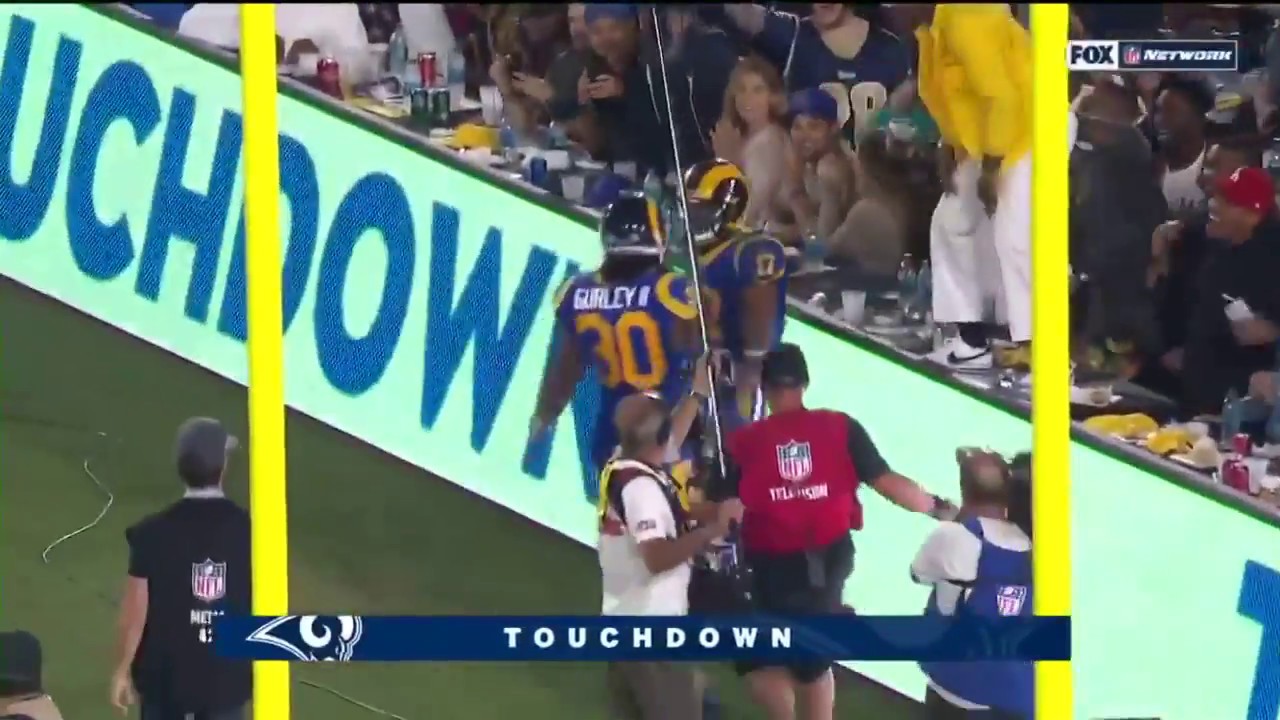 Robert Woods celebrates with rapper YG after Touchdown