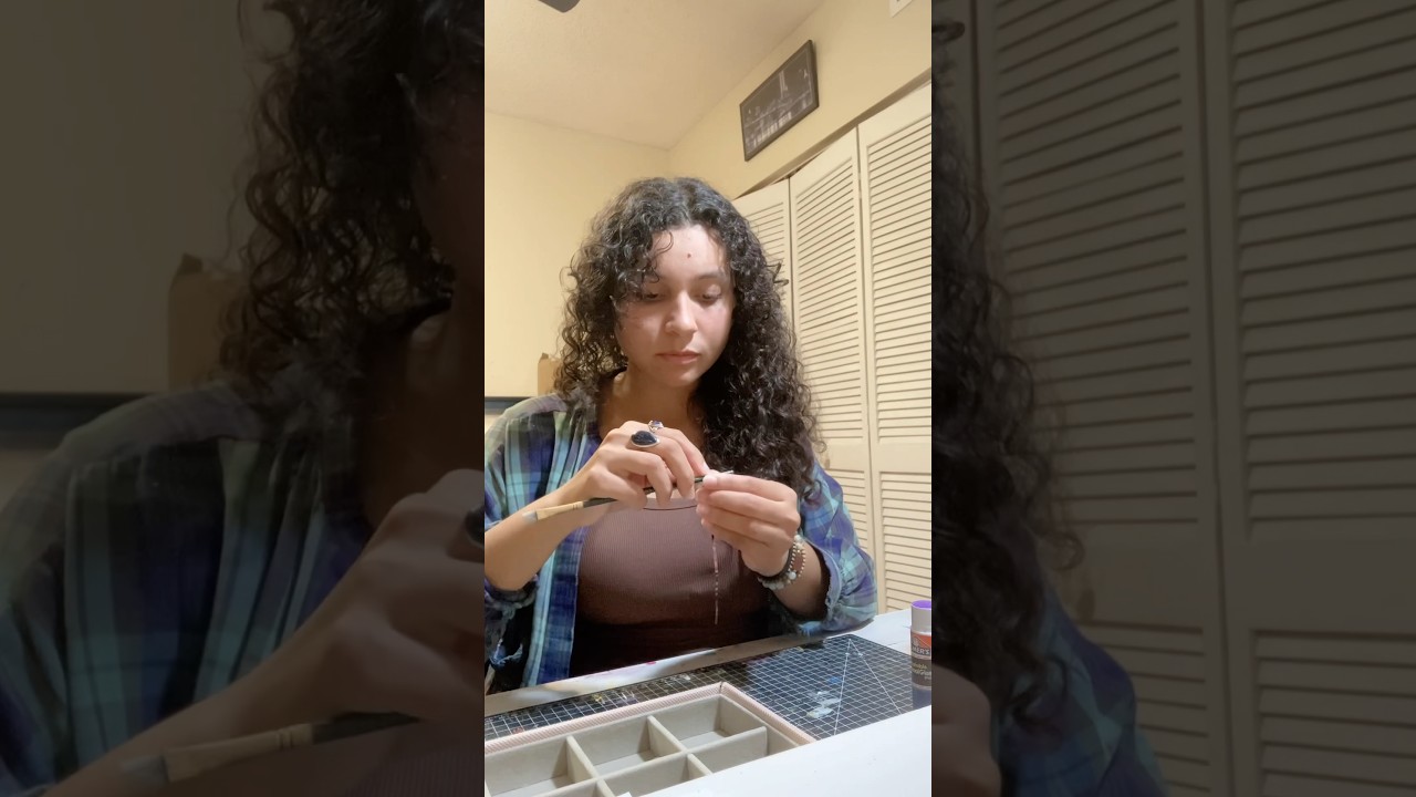 My morning as a small business owner. Rolling up paper beads 