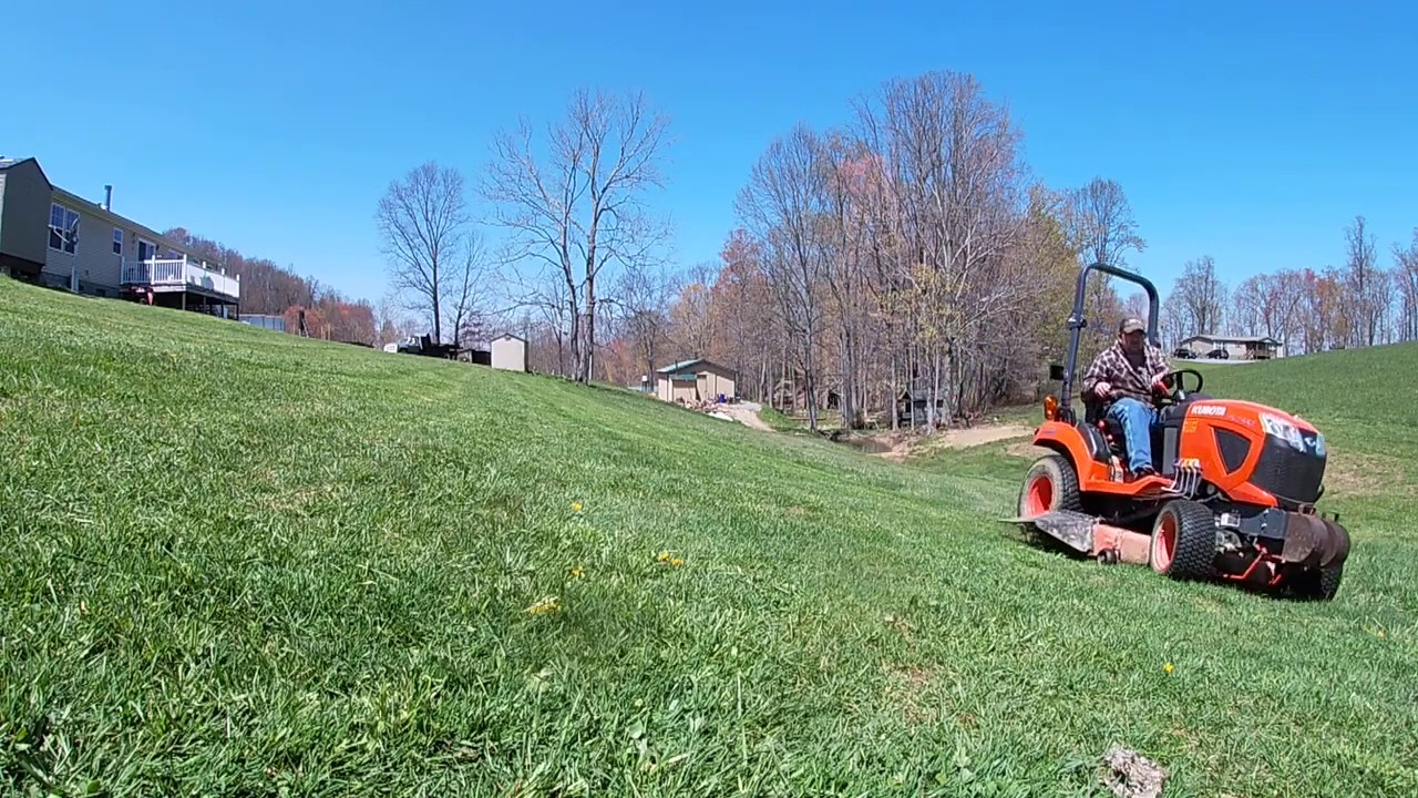 Kubota BX2380 mowing slopes!