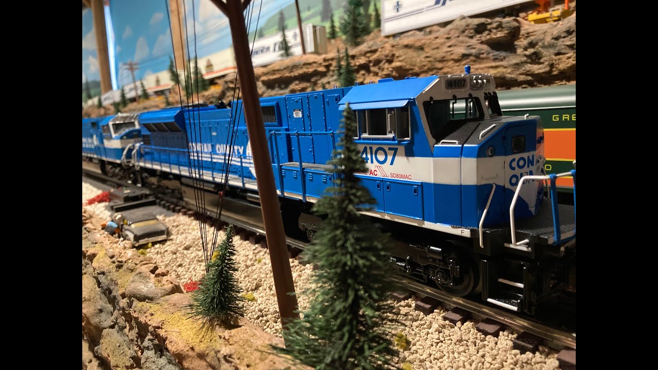 MTH TRAINS: A CONRAIL RUN (4 units at the point pulling a huge 'oil can' consist).