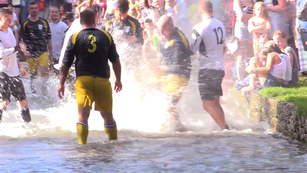 Bourton Rovers Takes Part In The Annual Football In The River Match!