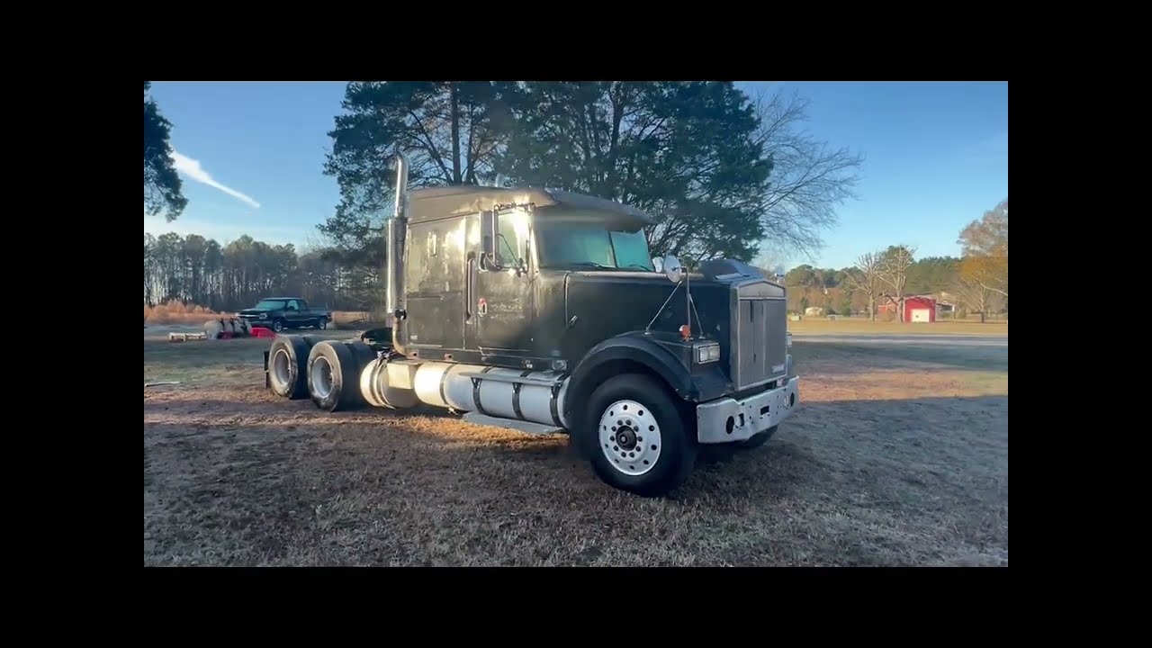 1989 White/GMC WIL 64T with 3406B cat walk around and little drive