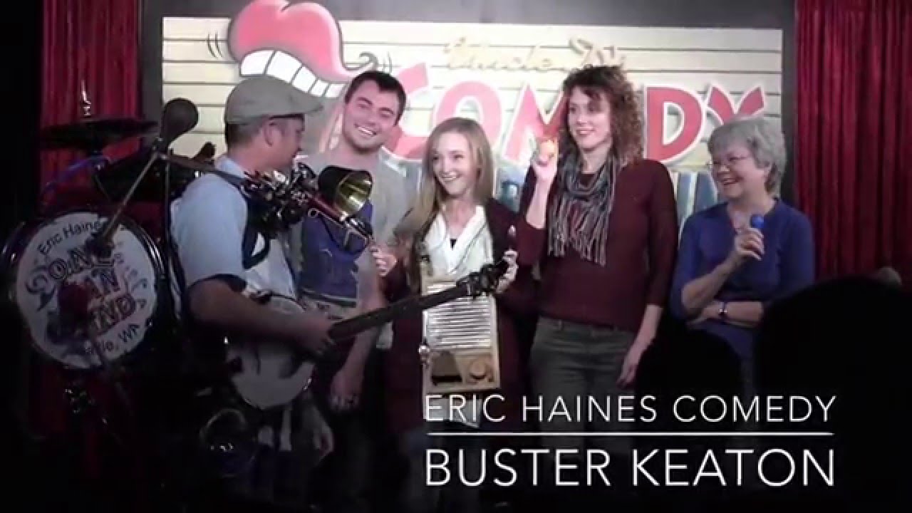 Comedian Eric Haines one man band in a comedy club.
