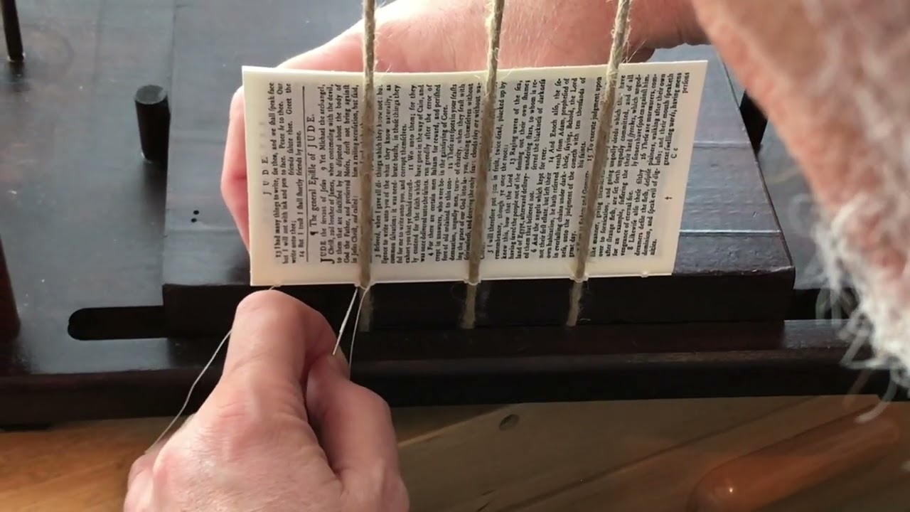 stitching text block of 1777 New Testament