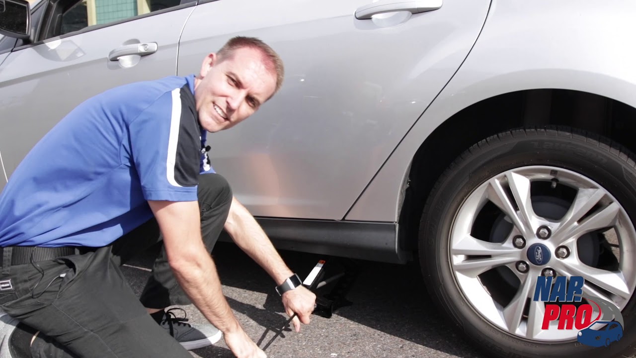 How to Safely Change Your Tire on the Side of the Road